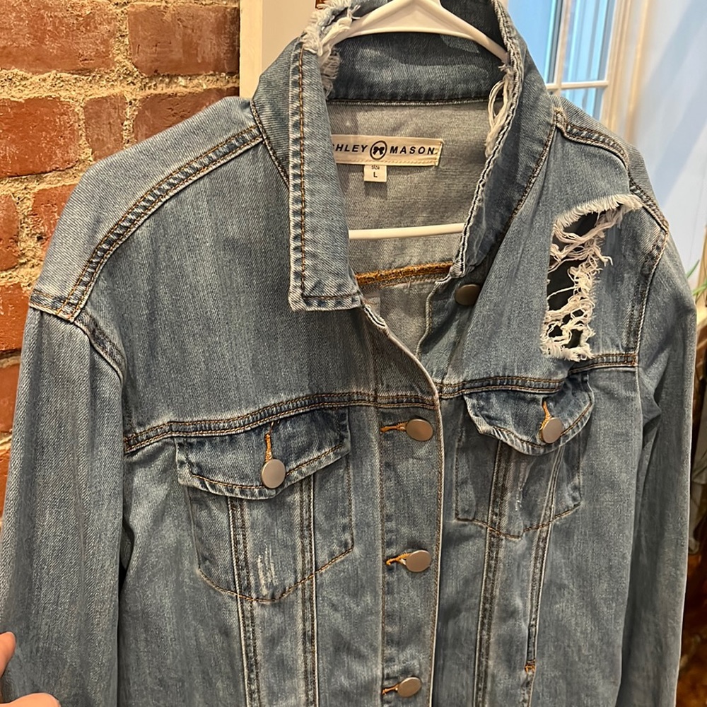Distressed denim jacket